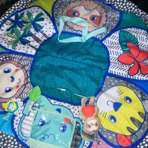 Baby activity may that Turns into a  cart cover.